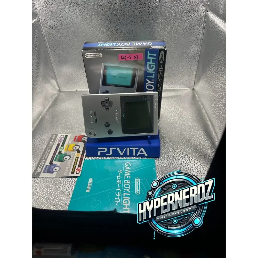 Sliver gameboy light in box! Amazing condition!